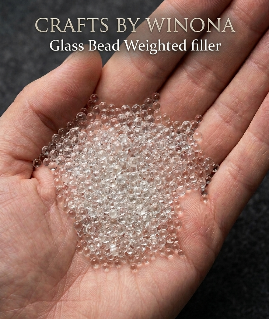 Winona Van Norman Glass Bead 0, Weighted filler in hand